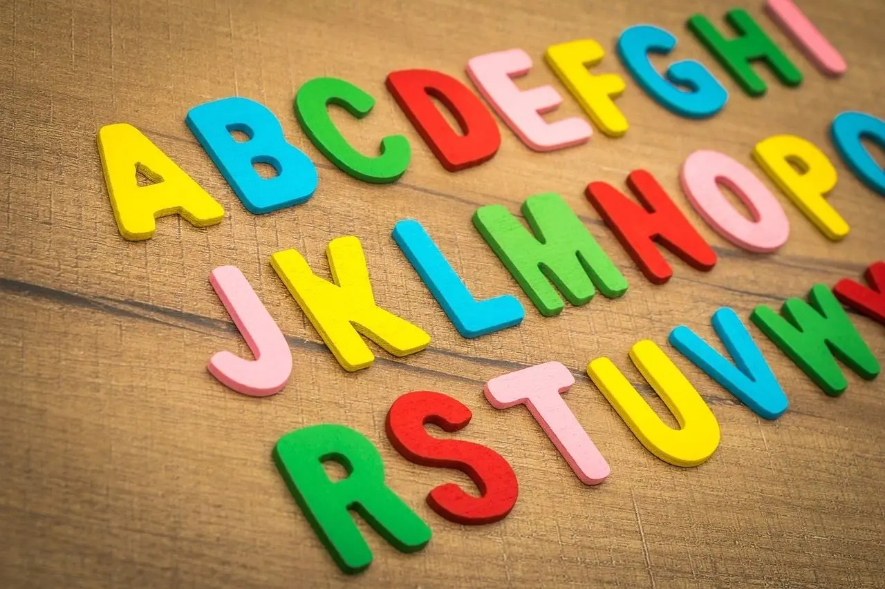 A closeup look at the alphabet letters in different colors.